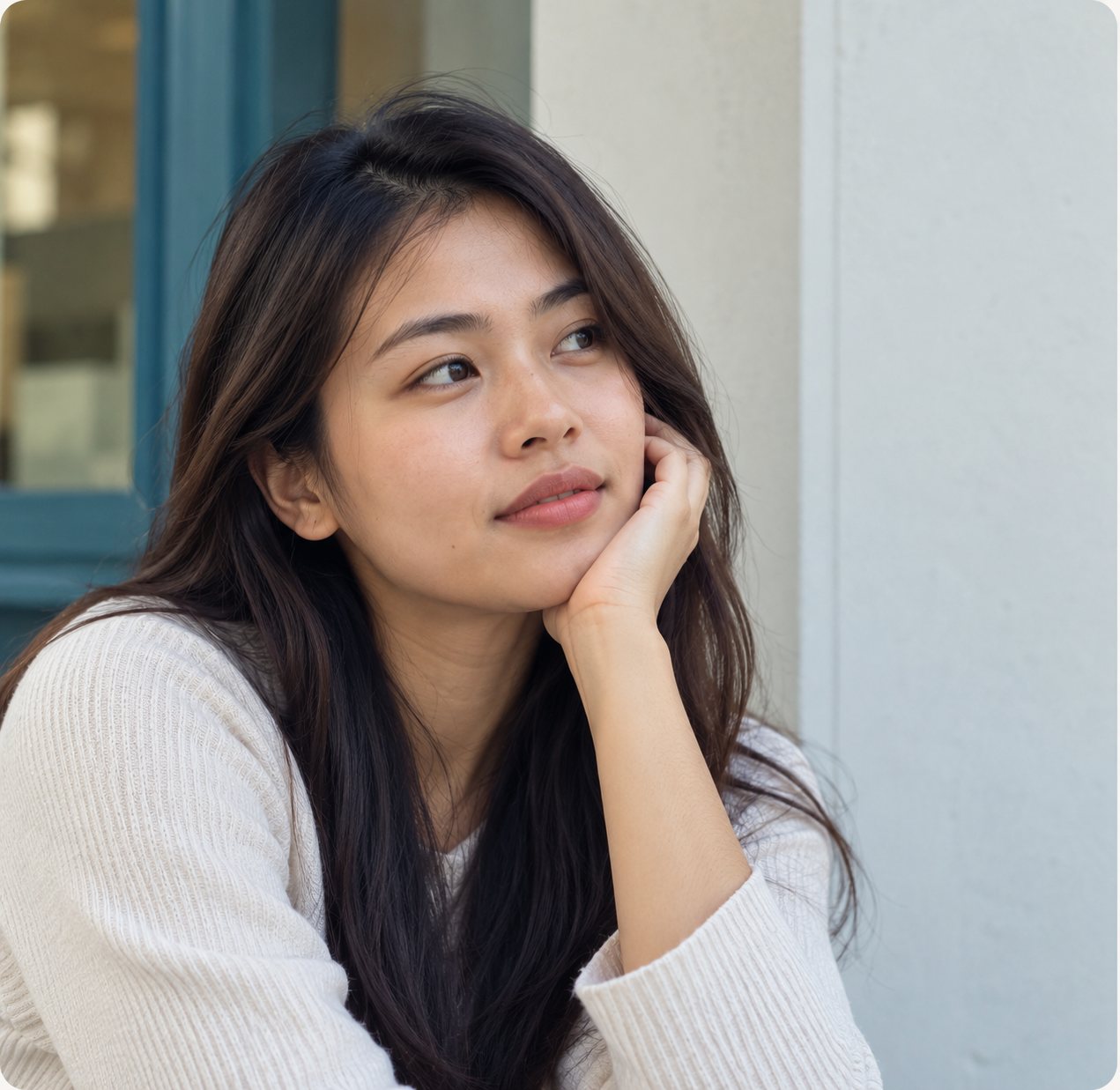 Woman reflecting on confidence and identity